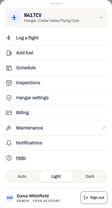 The More sheet: the aircraft card at the top, then Log a flight, Add fuel, Schedule, Inspections, Hangar settings, Billing, Maintenance, Notifications and Help, the Auto, Light and Dark buttons, and your name, which opens Your account, beside Sign out