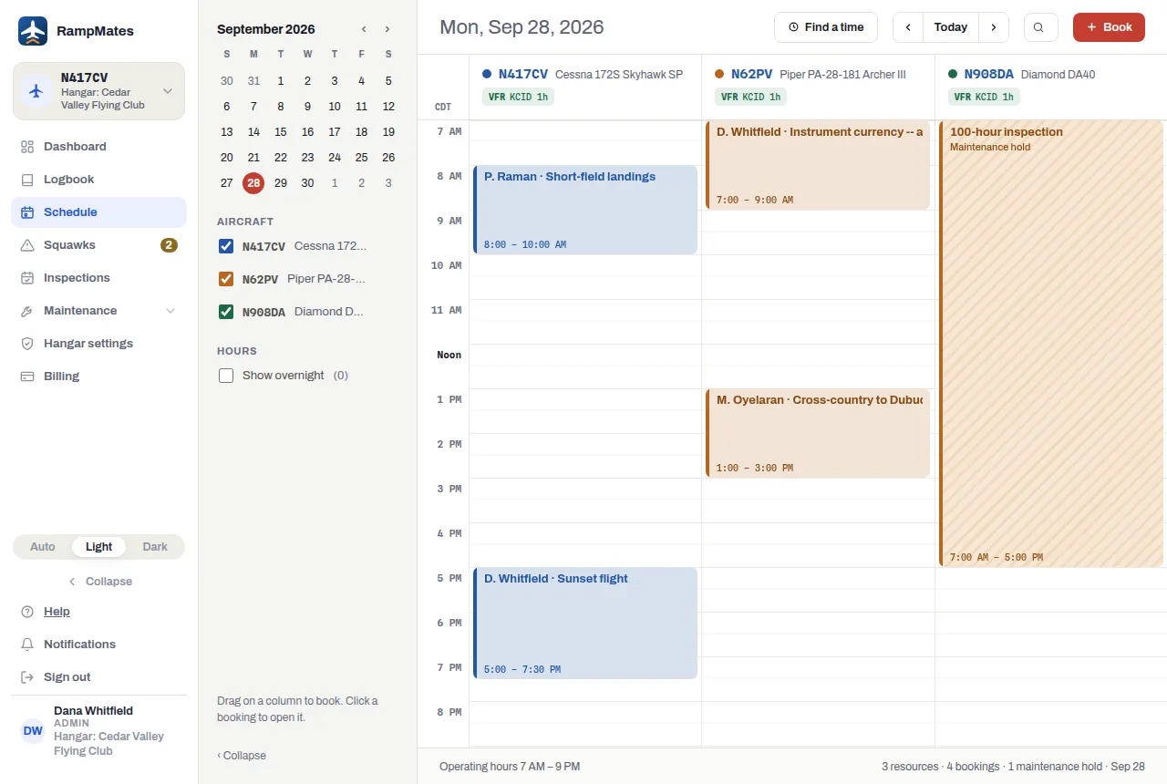 The schedule's day view: a column per aircraft, the hours down the left, bookings as colored blocks